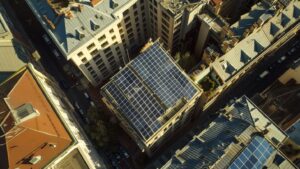 Futuristic solar panel installation in urban setting captured by drone.